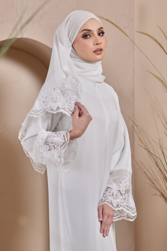Huda Abaya in Off White